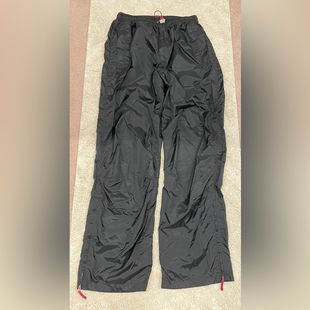 Black nylon parachute pants